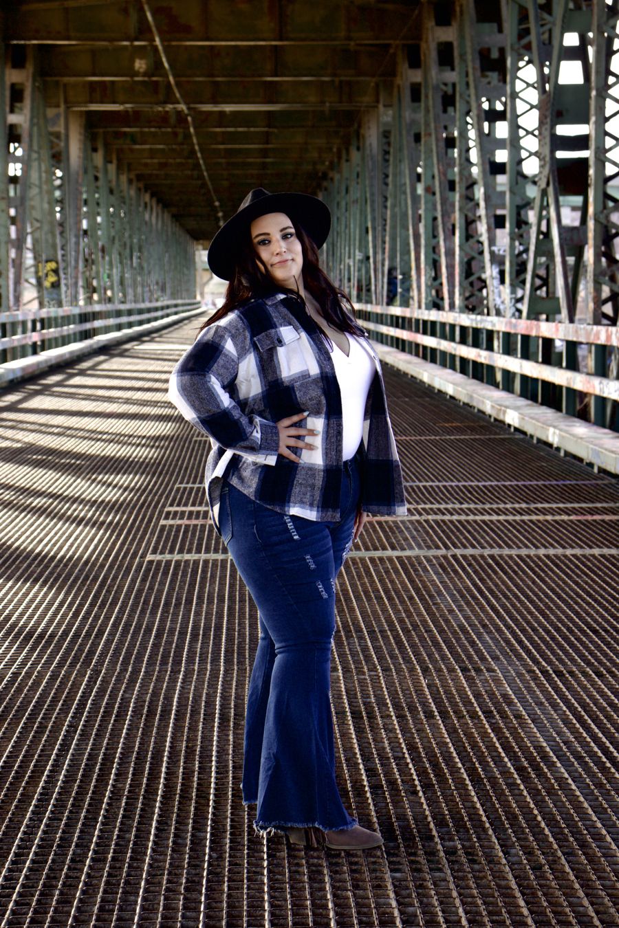 Rebekkah on a steel bridge in Kansas City